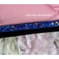 Tapis rose bord noir